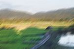 Abstract Motion Blur Background From Green Rice Field Stock Photo