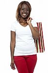 African Girl Holding Shopping Bag Stock Photo