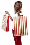 African Girl Holding Shopping Bag Stock Photo