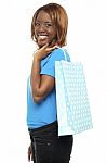 African Girl Holding Shopping Bag Stock Photo