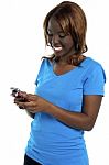 African Girl Sending Message Stock Photo