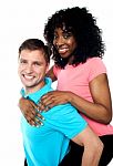 African Lady Enjoying Piggy Ride Stock Photo