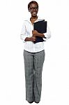 African Lady Executive Holding File Stock Photo