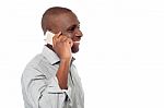 African Male Using Is Cell Phone Stock Photo