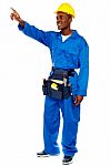 African Man Worker Pointing Forward Stock Photo