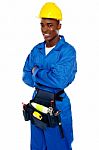 African Worker With Arms Crossed Stock Photo