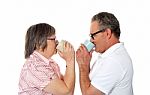 Aged Couple Drinking Coffee Stock Photo