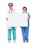 Aged Doctors Holding Blank Board Stock Photo