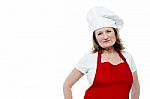 Aged Female Chef Posing In Style Stock Photo