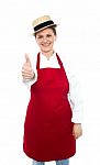 Aged Lady Chef Showing Thumb Up Stock Photo