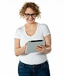 Aged Lady Working With Tablet Pc Stock Photo