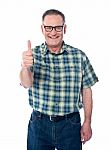 Aged Man Showing Thumbs up Stock Photo