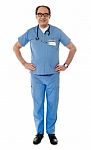 Aged Medical Professional Standing Stock Photo