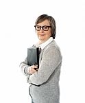 Aged Woman Holding File Stock Photo