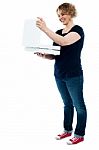 Aged Woman Looking Pizza Box Stock Photo