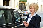 Aged Woman Using Her Mobile Phone Stock Photo