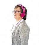 Aged Woman Wearing Headphone Stock Photo