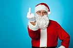 Agitated Santa Showing His Middle Finger Stock Photo