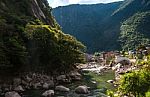 Aguas Calientes, The Town And Railway Station At The Foot Of The Stock Photo