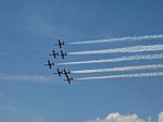 Aircrafts Painting The Blue Sky Stock Photo