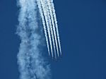 Aircrafts Painting The Blue Sky Stock Photo