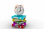 Alarm Clock Near Stack Of Books Over White Stock Photo