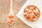 Almond Grain Roast Salt On Weathered Wooden Table Stock Photo