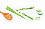 Aloe Vera Fresh Leaves With Aloe Vera Gel On Wooden Spoon Stock Photo