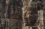 Ancient Stone Face Of Bayon Temple Stock Photo