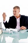 Angry Businessman Crushing Paper Stock Photo