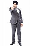 Angry Businessman Pointing Towards You Stock Photo