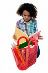 Anxious School Girl Reading A Book Stock Photo