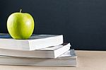 Apple On Books Stock Photo