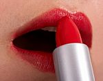 Applying Red Lipstick Stock Photo