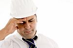 Architect Holding His Head In Pain Stock Photo