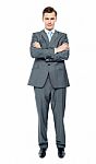 Arms Crossed Businessman Stock Photo