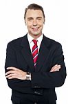 Arms Crossed Portrait Of Caucasian Businessman Stock Photo