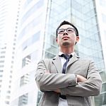 Asia Business Man Using A Mobile Phone Stock Photo