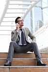 Asia Businessman Using A Mobile Phone Stock Photo