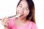 Asia Girl Eating Salmon Fish Stock Photo