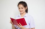 Asia Thai High School Student Uniform Beautiful Girl Read A Book Stock Photo