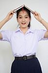 Asia Thai High School Student Uniform Beautiful Girl Read A Book Stock Photo