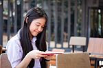 Asia Thai High School Student Uniform Beautiful Girl Read A Book Stock Photo