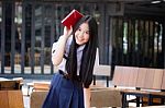 Asia Thai High School Student Uniform Beautiful Girl Read A Book Stock Photo