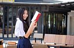 Asia Thai High School Student Uniform Beautiful Girl Read A Book Stock Photo