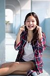 Asia Thai Teenager Women Scotch T-shirt Relax And Smile Stock Photo