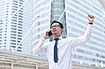 Asian Business Man Speaking Mobile Phone Stock Photo