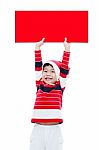 Asian Christmas Boy With Empty Banner Stock Photo