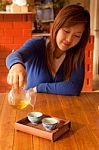 Asian Girl Drinking Tea In Morning Stock Photo