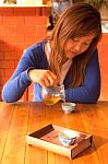 Asian Girl Drinking Tea In Morning Stock Photo